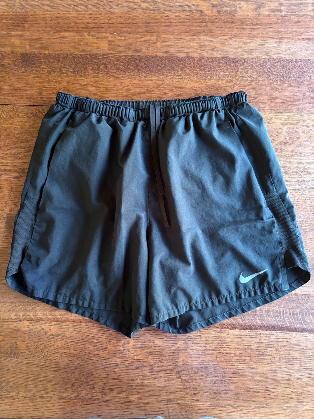 Nike Black Athletic Shorts with Teal Swoosh